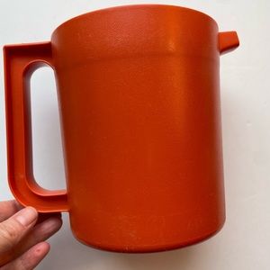 Vintage orange Tupperware small/short pitcher. 1575-4